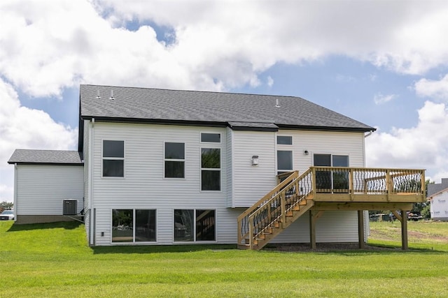 806 Crestview Dr, Solon, IA 52333 - back of house with stairway, a lawn, a wooden deck, and a shingled roof