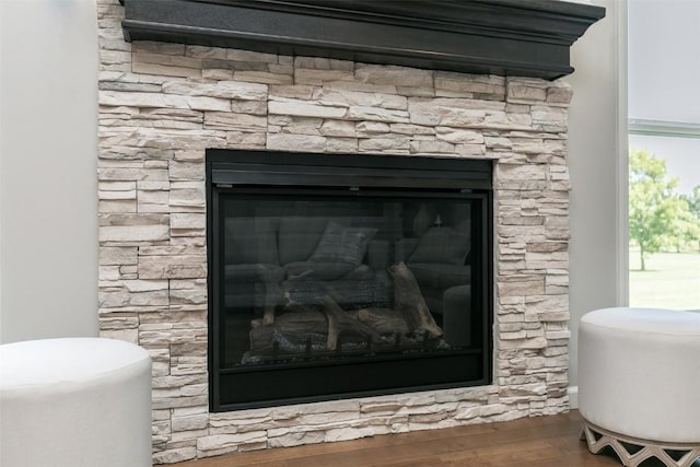 806 Crestview Dr, Solon, IA 52333 - detailed view of wood finished floors and a fireplace