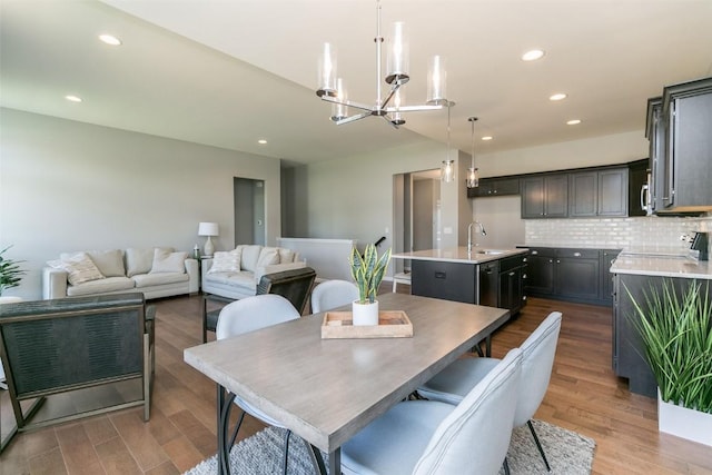 806 Crestview Dr, Solon, IA 52333 - dining room with a chandelier, dark wood finished floors, and recessed lighting