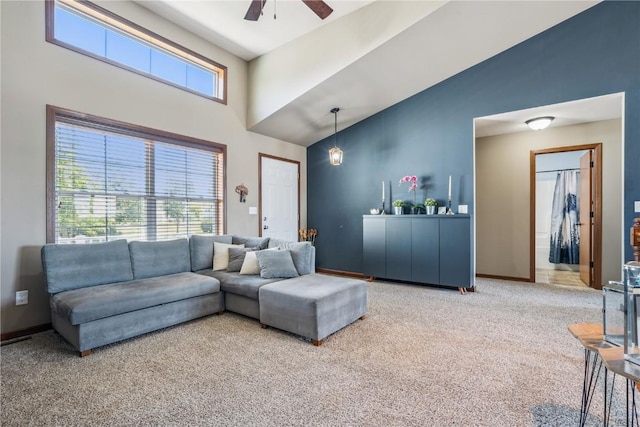 1301 Scarlet Sage Dr SW, Cedar Rapids, IA 52404 - carpeted living area with a towering ceiling and ceiling fan