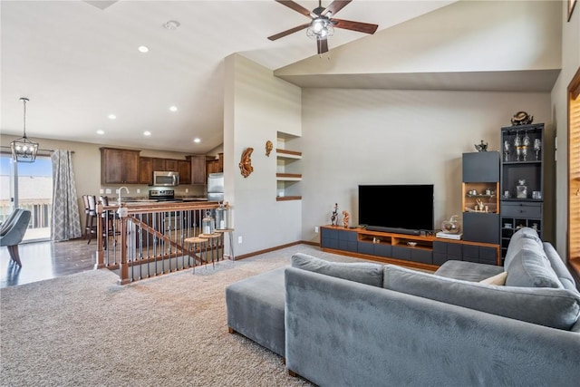 1301 Scarlet Sage Dr SW, Cedar Rapids, IA 52404 - living room with ceiling fan, light colored carpet, recessed lighting, and high vaulted ceiling