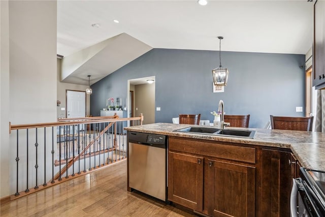 1301 Scarlet Sage Dr SW, Cedar Rapids, IA 52404 - kitchen with dishwasher, light wood finished floors, range, vaulted ceiling, and hanging light fixtures