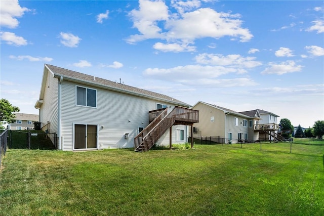 1301 Scarlet Sage Dr SW, Cedar Rapids, IA 52404 - back of property with stairway, a wooden deck, and a fenced backyard