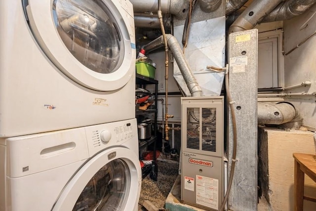 1120 23rd St, Cedar Rapids, IA 52403 - washroom featuring stacked washer / dryer