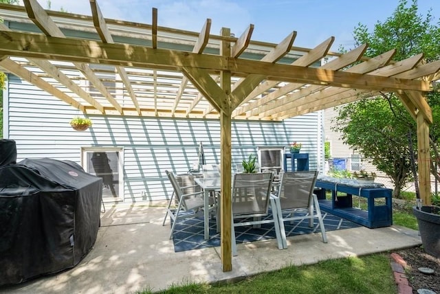 1120 23rd St, Cedar Rapids, IA 52403 - view of patio with a pergola, outdoor dining space, and grilling area