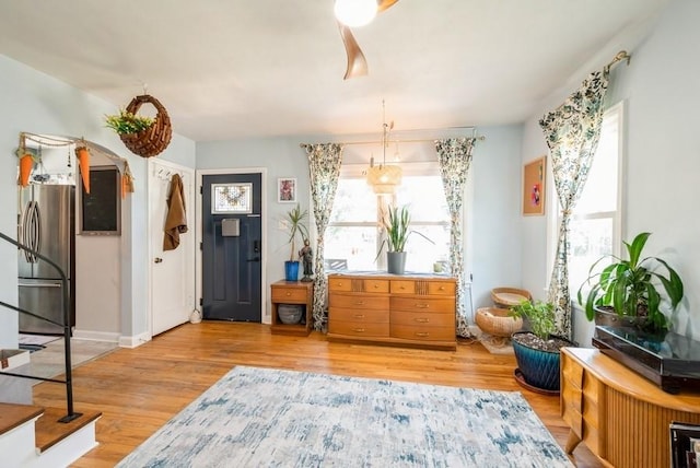 1120 23rd St, Cedar Rapids, IA 52403 - sitting room featuring light wood-style floors and stairway