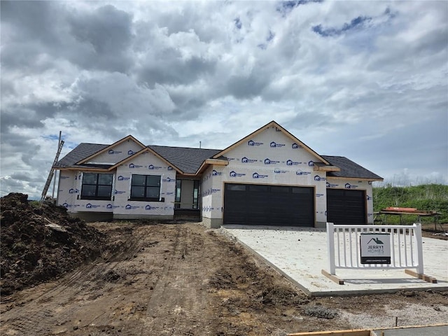 3339 Center Ct, Robins, IA 52328 - property under construction featuring a garage, driveway, and a shingled roof