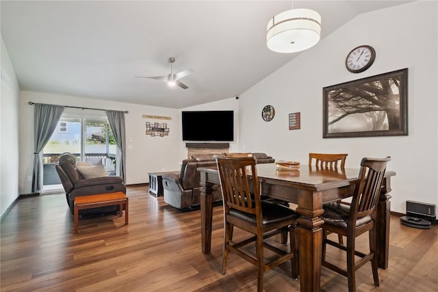 915 Prairie View Dr, West Branch, IA 52358 - dining room featuring lofted ceiling, wood finished floors, and a ceiling fan