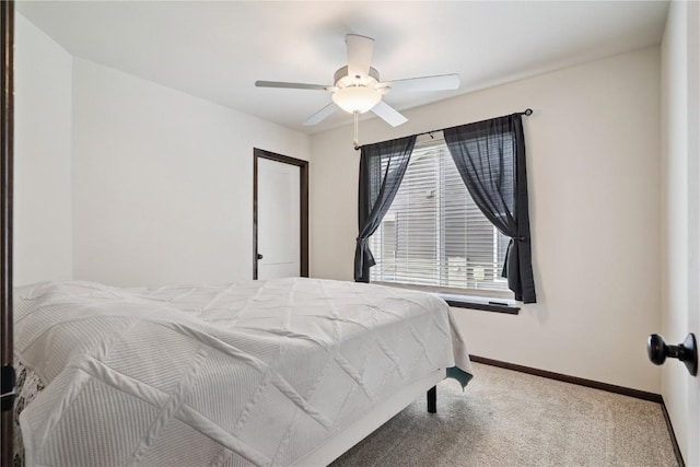 915 Prairie View Dr, West Branch, IA 52358 - bedroom with carpet and a ceiling fan