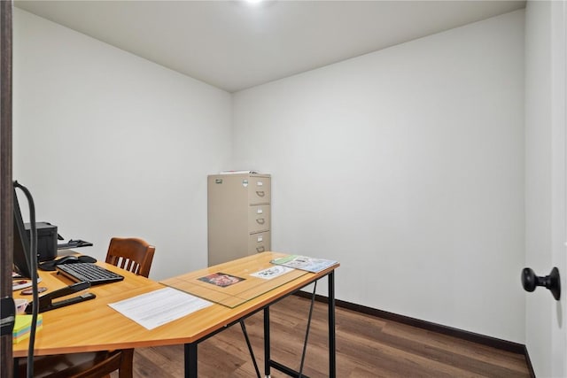 915 Prairie View Dr, West Branch, IA 52358 - office space with dark wood-style floors and baseboards