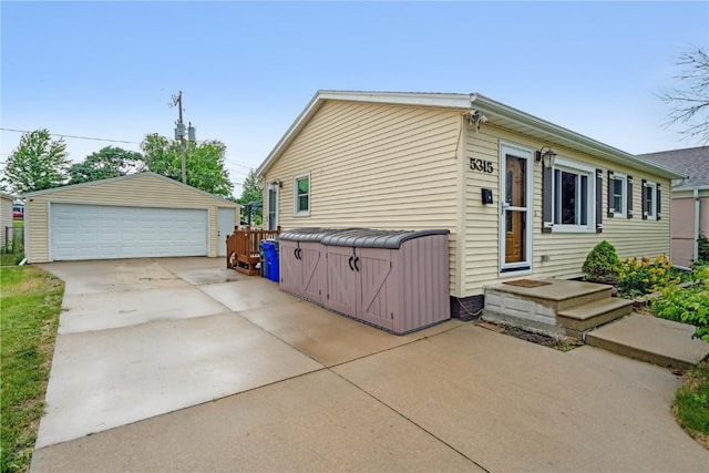 5315 E Ave NW, Cedar Rapids, IA 52405 - view of property exterior with a garage and an outdoor structure