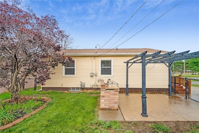 5315 E Ave NW, Cedar Rapids, IA 52405 - rear view of house with a patio area and a pergola
