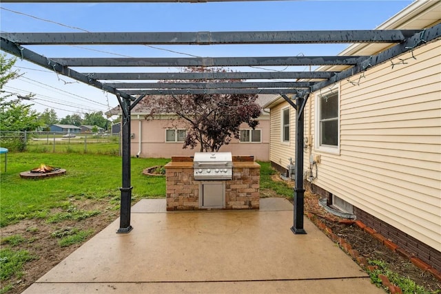 5315 E Ave NW, Cedar Rapids, IA 52405 - view of patio / terrace with an outdoor fire pit, an outdoor kitchen, and a pergola