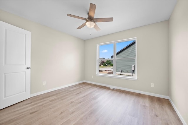 3880 Quail Trail Dr, Marion, IA 52302 - empty room featuring light wood-type flooring and ceiling fan