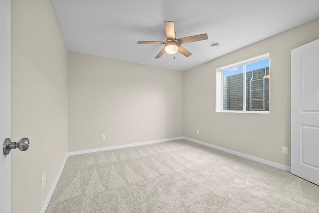 3880 Quail Trail Dr, Marion, IA 52302 - carpeted empty room with a ceiling fan and baseboards