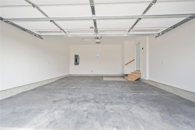 3880 Quail Trail Dr, Marion, IA 52302 - garage with electric panel and a garage door opener