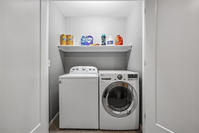 115 3rd St NE, Mount Vernon, IA 52314 - washroom with washing machine and clothes dryer
