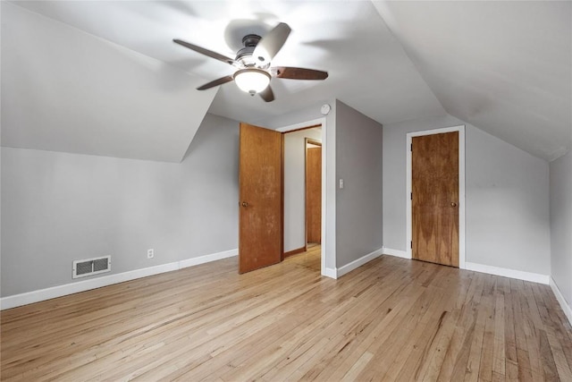 115 3rd St NE, Mount Vernon, IA 52314 - bonus room featuring wood-type flooring, ceiling fan, and vaulted ceiling