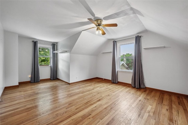 115 3rd St NE, Mount Vernon, IA 52314 - additional living space with light wood-style floors, vaulted ceiling, and a ceiling fan
