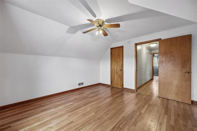 115 3rd St NE, Mount Vernon, IA 52314 - additional living space with light wood-type flooring, vaulted ceiling, and a ceiling fan