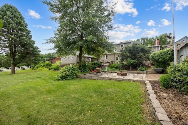 115 3rd St NE, Mount Vernon, IA 52314 - view of yard featuring a fire pit and a patio