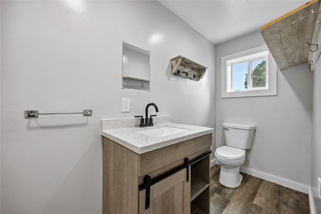 115 3rd St NE, Mount Vernon, IA 52314 - bathroom with vanity and wood finished floors