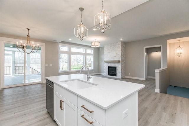 5750 Meadow Grass Cir SE, Cedar Rapids, IA 52403 - kitchen featuring a chandelier, light wood-type flooring, and recessed lighting