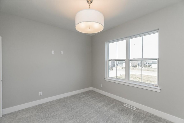 5750 Meadow Grass Cir SE, Cedar Rapids, IA 52403 - carpeted empty room featuring baseboards