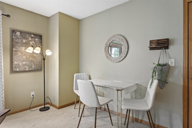 2861 Coral Ct Unit 302, Coralville, IA 52241 - dining room with carpet floors and baseboards