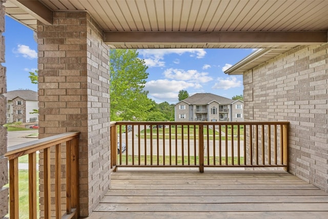 2861 Coral Ct Unit 302, Coralville, IA 52241 - wooden deck featuring a residential view