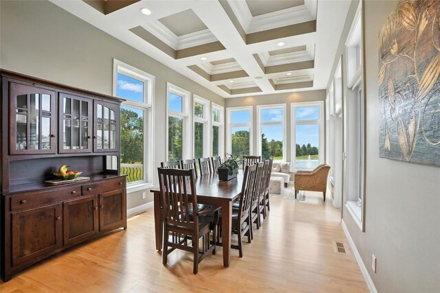 701 Sherwood Dr, Iowa City, IA 52245 - dining room with beam ceiling, light wood-style floors, coffered ceiling, ornamental molding, and recessed lighting