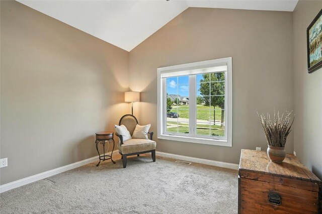701 Sherwood Dr, Iowa City, IA 52245 - living area with lofted ceiling and carpet