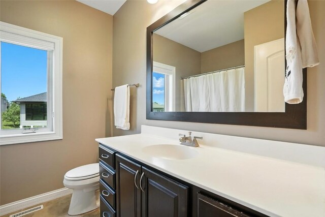 701 Sherwood Dr, Iowa City, IA 52245 - bathroom featuring vanity and curtained shower