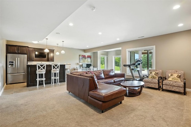 701 Sherwood Dr, Iowa City, IA 52245 - living area with light colored carpet and recessed lighting