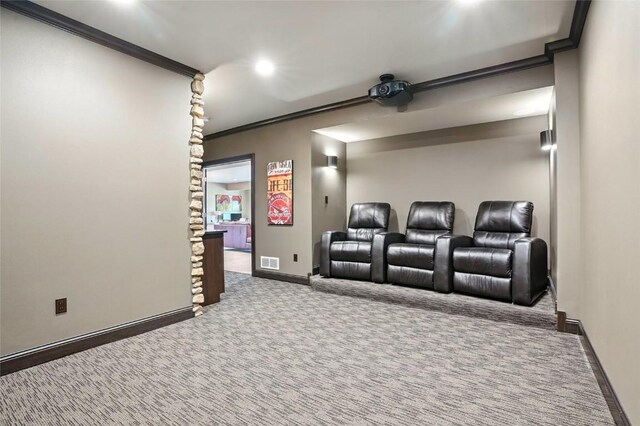 701 Sherwood Dr, Iowa City, IA 52245 - carpeted home theater room with ornamental molding and recessed lighting