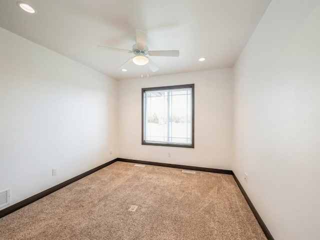 3502 Bluebird Dr SW, Cedar Rapids, IA 52404 - carpeted spare room featuring recessed lighting and ceiling fan