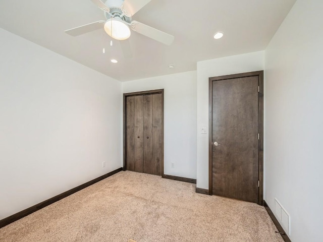 3502 Bluebird Dr SW, Cedar Rapids, IA 52404 - unfurnished bedroom with carpet floors, a closet, recessed lighting, and ceiling fan