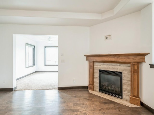 3502 Bluebird Dr SW, Cedar Rapids, IA 52404 - unfurnished living room with a tile fireplace and wood finished floors