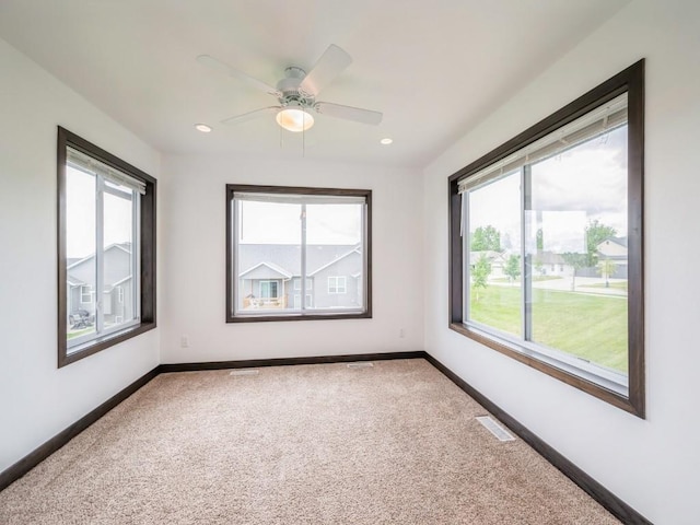 3502 Bluebird Dr SW, Cedar Rapids, IA 52404 - carpeted empty room with ceiling fan and recessed lighting