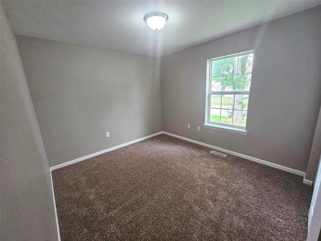 441 8th Ave SW, Cedar Rapids, IA 52404 - empty room with carpet and baseboards