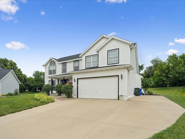 725 High Point Dr SW, Cedar Rapids, IA 52404 - traditional-style house with concrete driveway, a front lawn, an attached garage, and board and batten siding