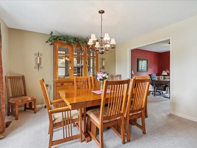 725 High Point Dr SW, Cedar Rapids, IA 52404 - dining area with light colored carpet and a chandelier