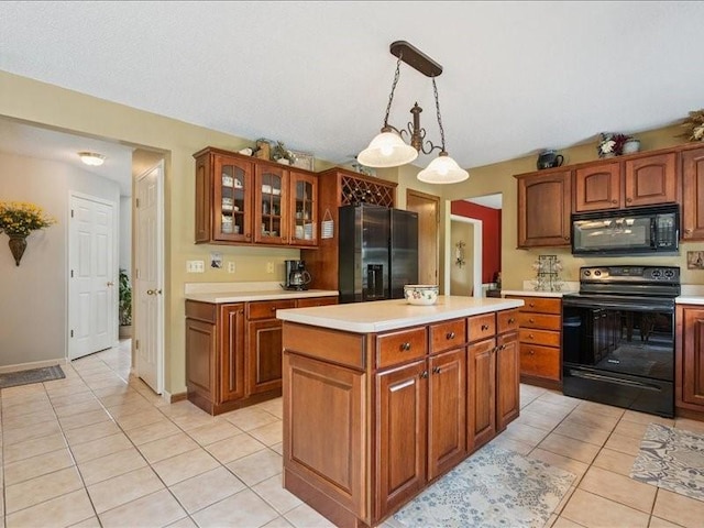725 High Point Dr SW, Cedar Rapids, IA 52404 - kitchen with black appliances, light countertops, light tile patterned floors, and glass insert cabinets