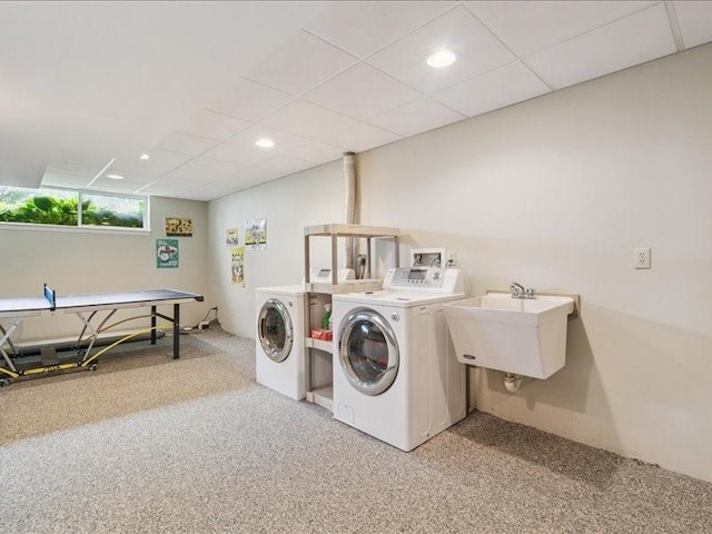 725 High Point Dr SW, Cedar Rapids, IA 52404 - laundry room featuring separate washer and dryer, light colored carpet, and recessed lighting