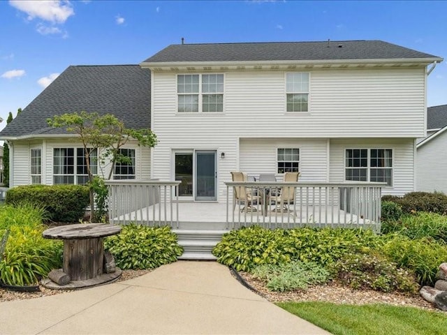 725 High Point Dr SW, Cedar Rapids, IA 52404 - back of house featuring a wooden deck and outdoor dining space