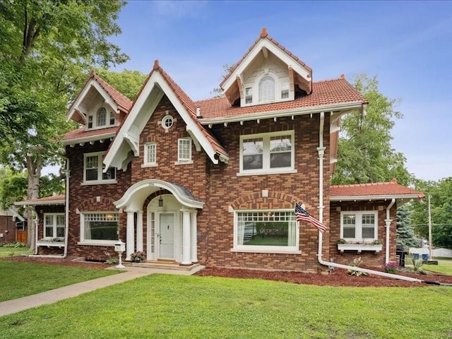 206 Kingbard Blvd, Waterloo, IA 50701 - view of front of house with a front yard and brick siding