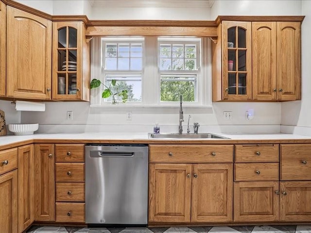 206 Kingbard Blvd, Waterloo, IA 50701 - kitchen featuring dishwasher, ornamental molding, brown cabinetry, light countertops, and glass insert cabinets