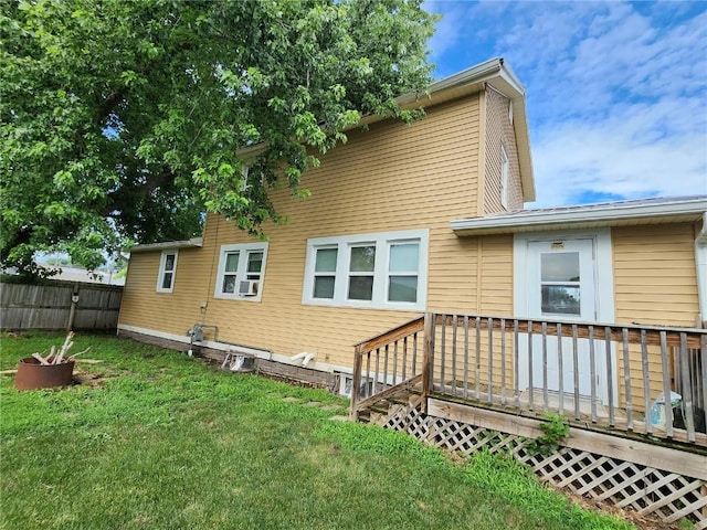 904 10th St, Belle Plaine, IA 52208 - back of property featuring a wooden deck