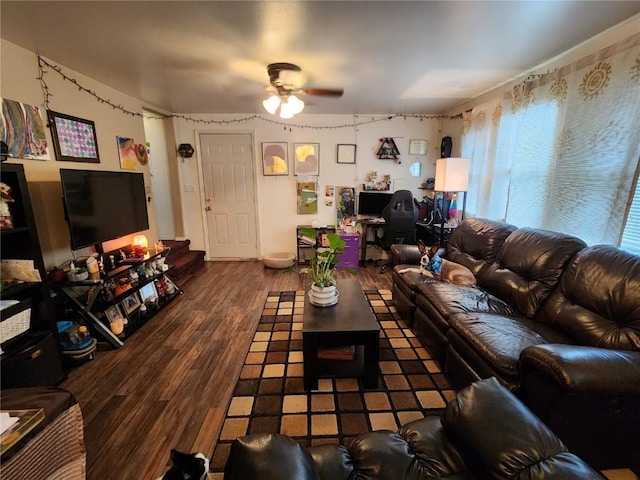 904 10th St, Belle Plaine, IA 52208 - living area featuring wood finished floors and a ceiling fan