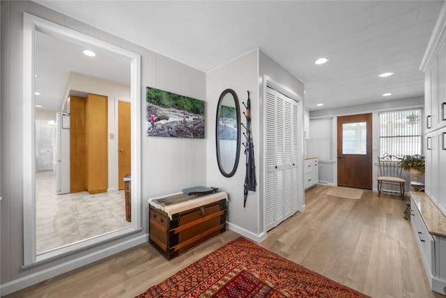 1104 Mulberry St, Tipton, IA 52772 - entryway featuring light wood finished floors and recessed lighting